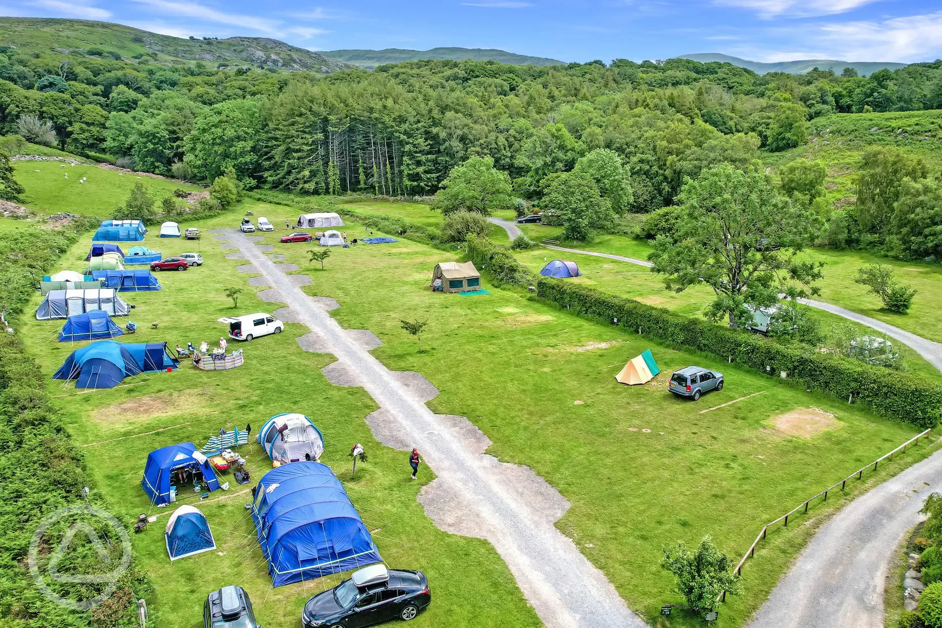 Aerial of the grass camping pitches with optional electric Aerial of the grass camping pitches with optional electric