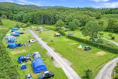 Aerial of the grass camping pitches with optional electric Aerial of the grass camping pitches with optional electric