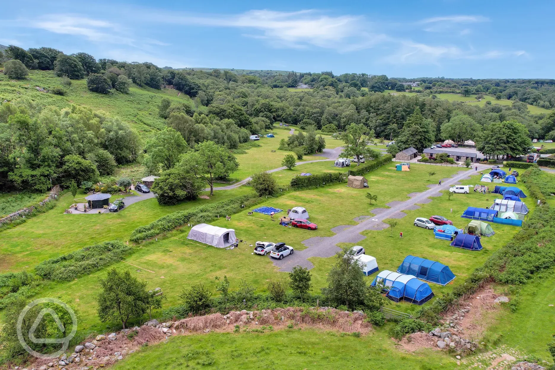 Aerial of grass camping pitches