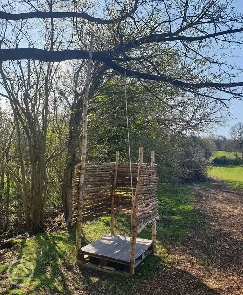 Solar shower in meadow pitches