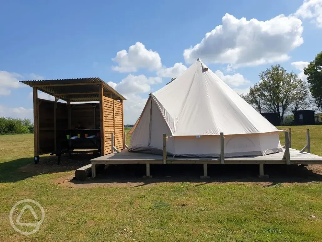Bell tent with covered kitchen area