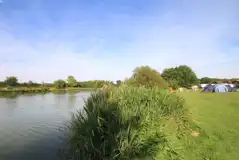 Non electric grass pitches by the lake