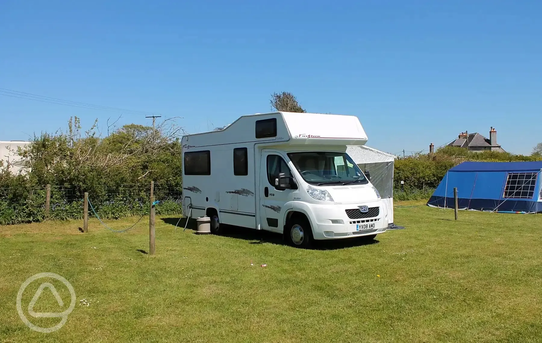 Electric grass pitches with 16 amp hook ups with rope dividers