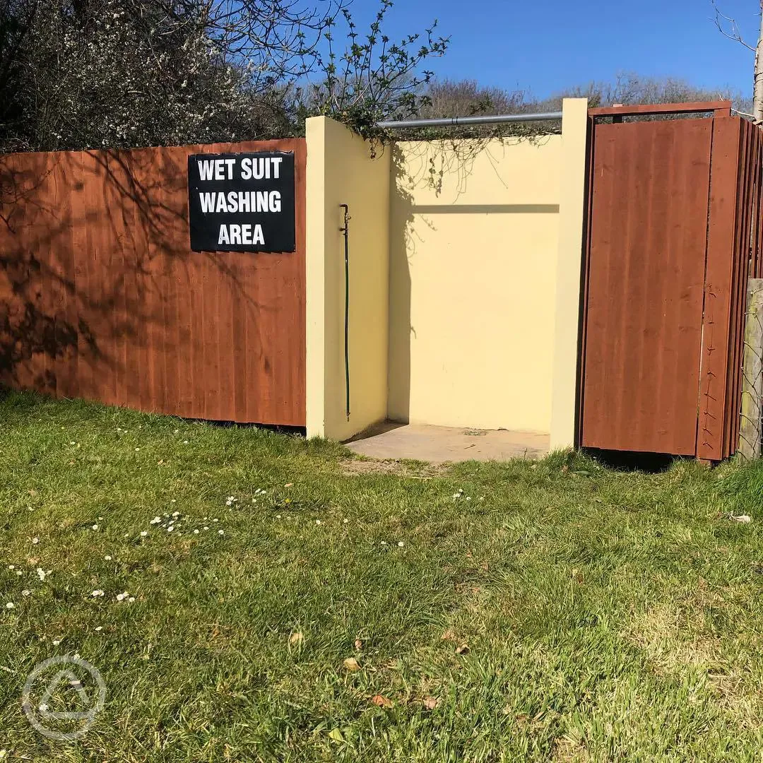 Wetsuit and surfboard wash 