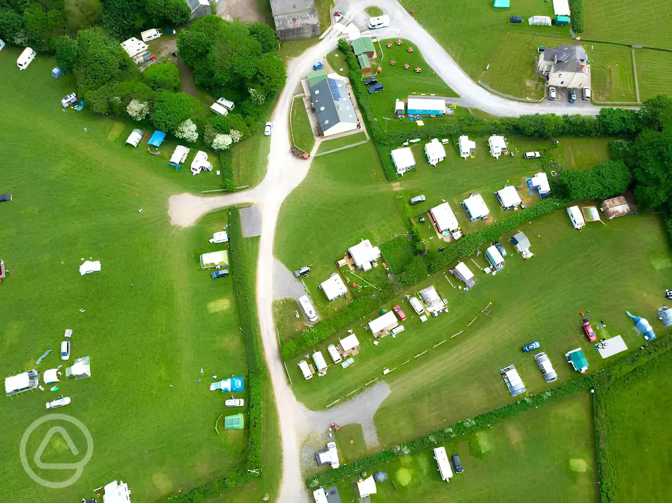 Bird's eye view of the campsite with hedges diving fields