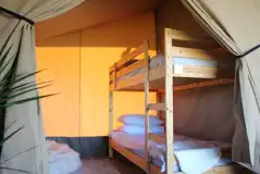 Safari tent bedroom with bunk beds Safari tent bedroom with bunk beds