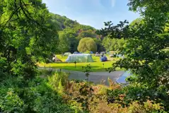 Small, medium, and large tents on electric grass pitches Small, medium, and large tents on electric grass pitches