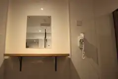 Mirror and hairdryer Mirror and hairdryer