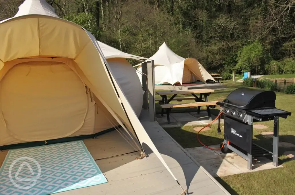 Unfurnished bell tent with BBQ
