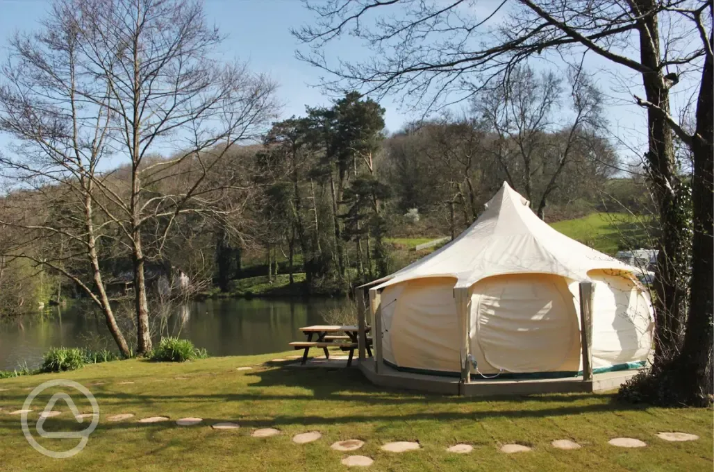 Unfurnished lake side bell tent