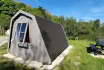 Cocoon camping pods (dog friendly) exterior with outdoor picnic benches