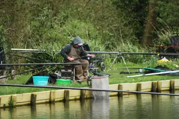 Onsite 1.5 acre fishing lake with carp, chubb, and bream at Mill Park Campsite