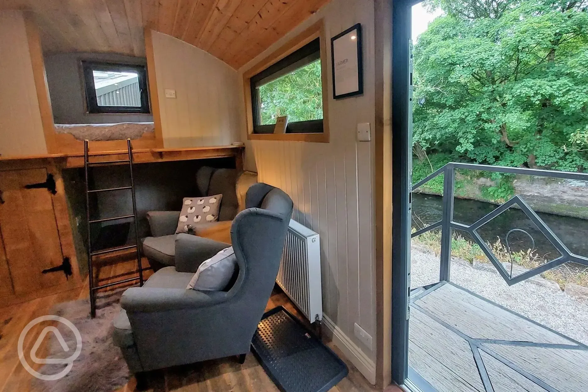 Jack's shepherd's hut interior and outside decking area