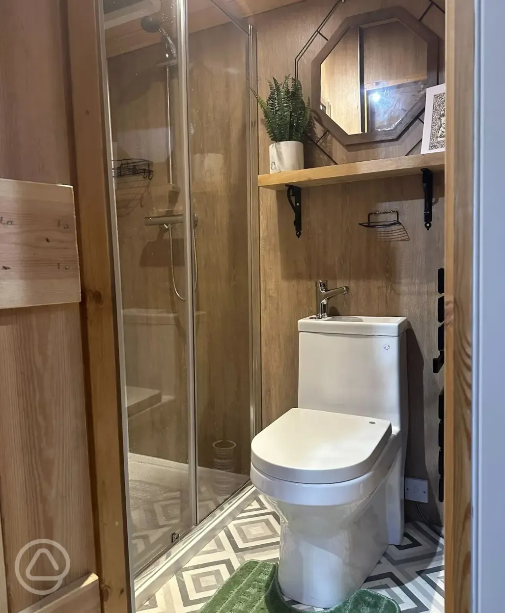 Jack's shepherd's hut ensuite with toilet and shower