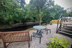 Jack's shepherd's hut outdoor seating by the river Jack's shepherd's hut outdoor seating by the river