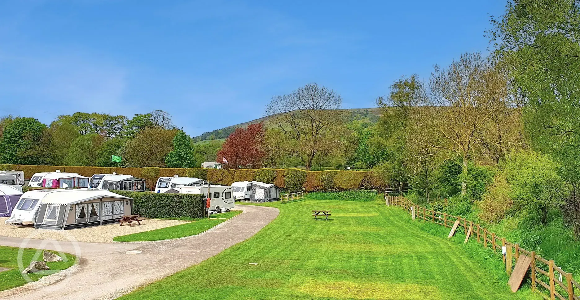 Grass and hardstanding pitches at Laneside Caravan Park