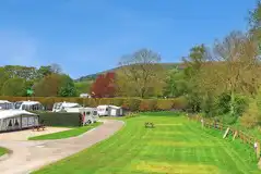 Grass and hardstanding pitches at Laneside Caravan Park