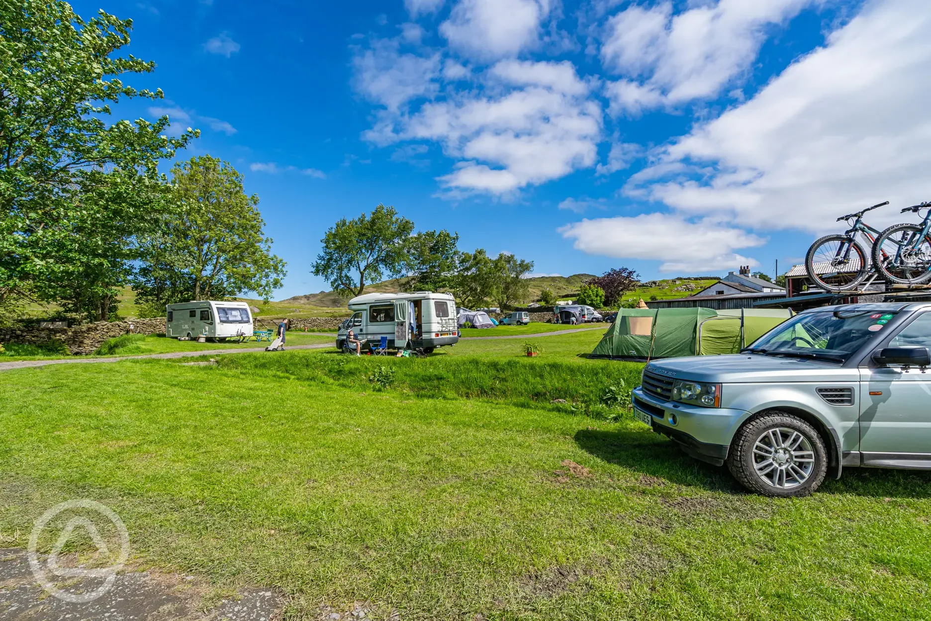 Electric grass pitches at Birchbank Camping Site (10 amp hook up)