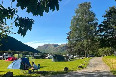 Non electric grass pitches with mountain views