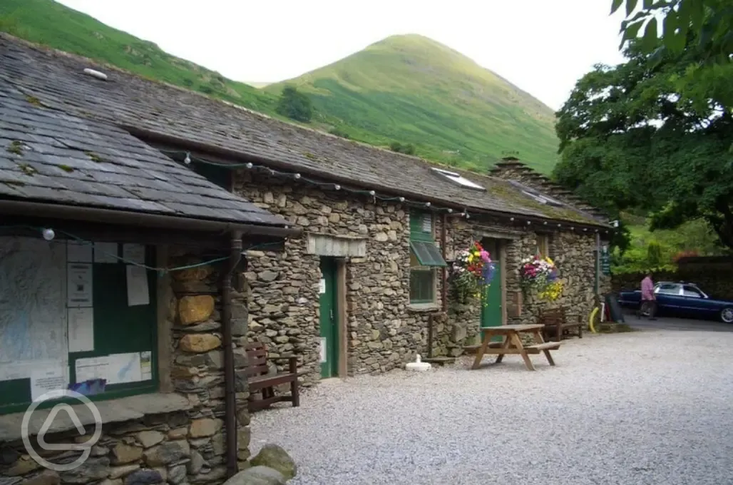 Facilities block with outdoor lighting and seating