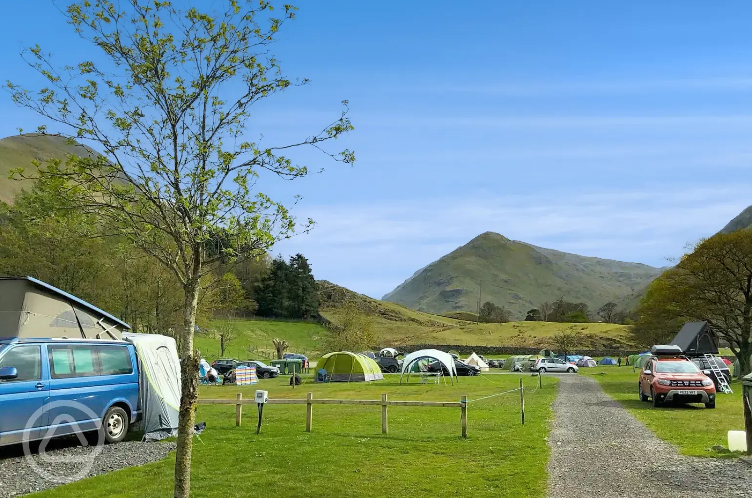 Non electric grass pitches with mountain views