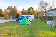 Non electric grass tent pitches (5m x 4m) by the River Irt