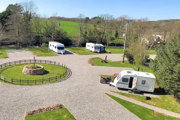 Aerial of the fully serviced hardstanding and grass touring pitches