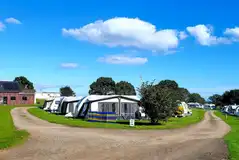 Pooh's Field with fully serviced hardstanding pitches Pooh's Field with fully serviced hardstanding pitches