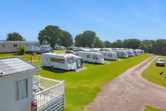 Fully serviced hardstanding pitches with electric, waste and water Fully serviced hardstanding pitches with electric, waste and water