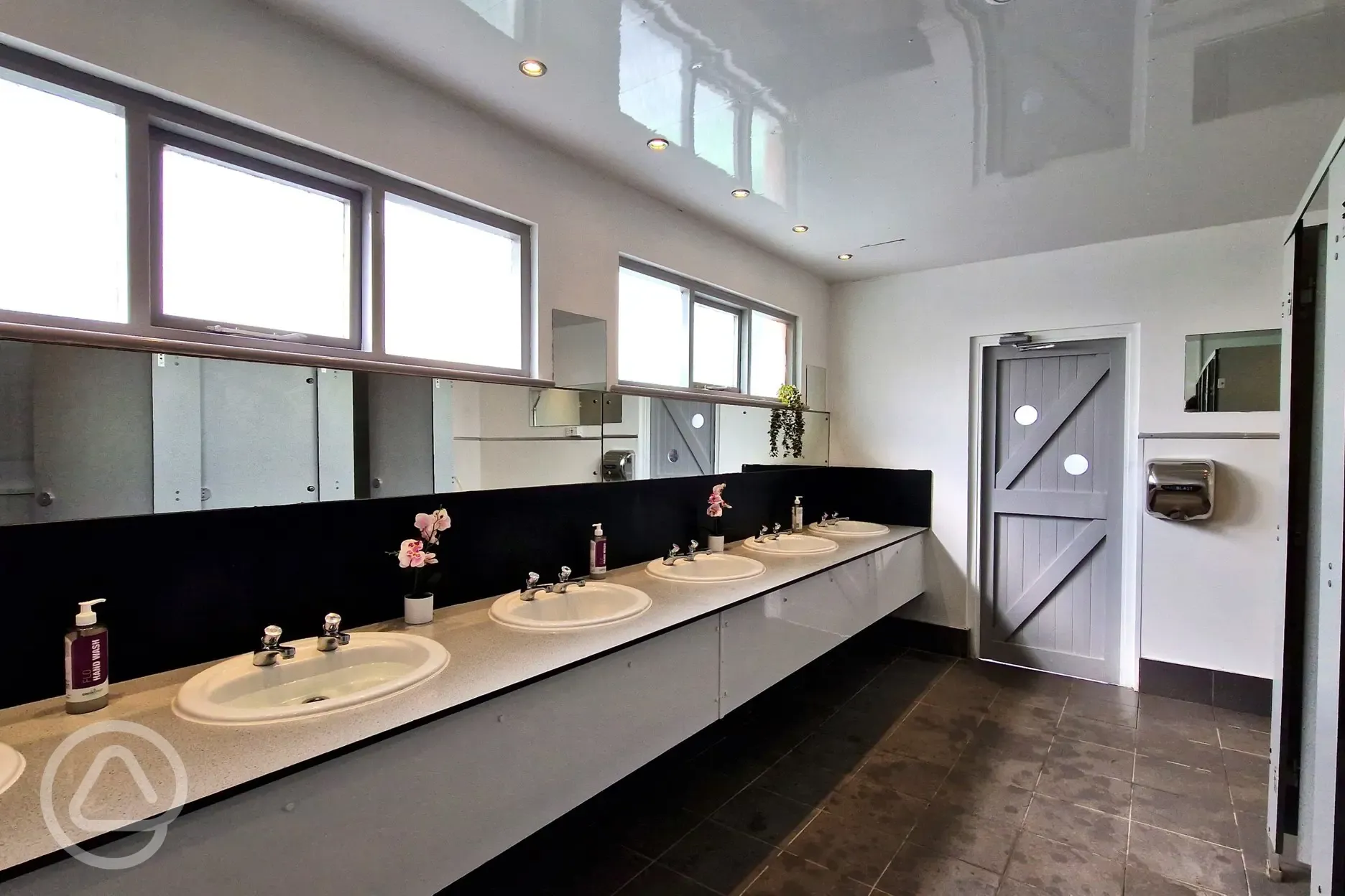 Mirrors and handwashing sinks in the toilets onsite