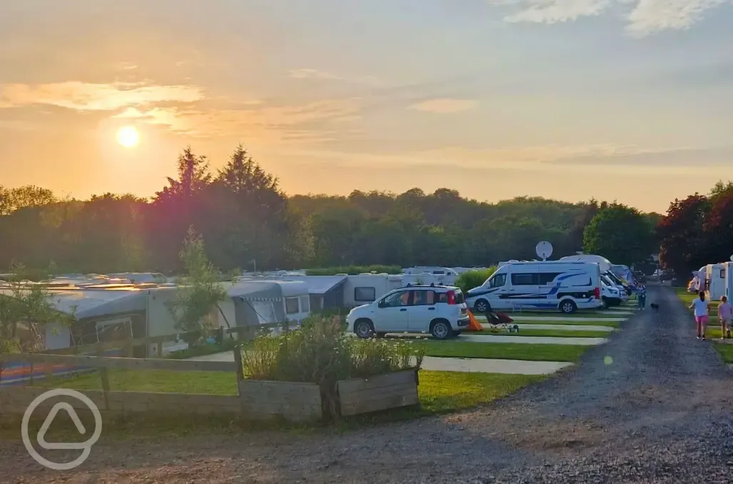 Hardstanding pitches with optional electric at sunset (awnings allowed)