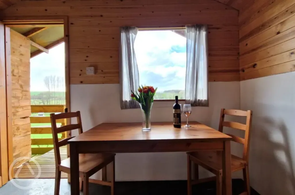 Hill View hut dining area in the two person unit