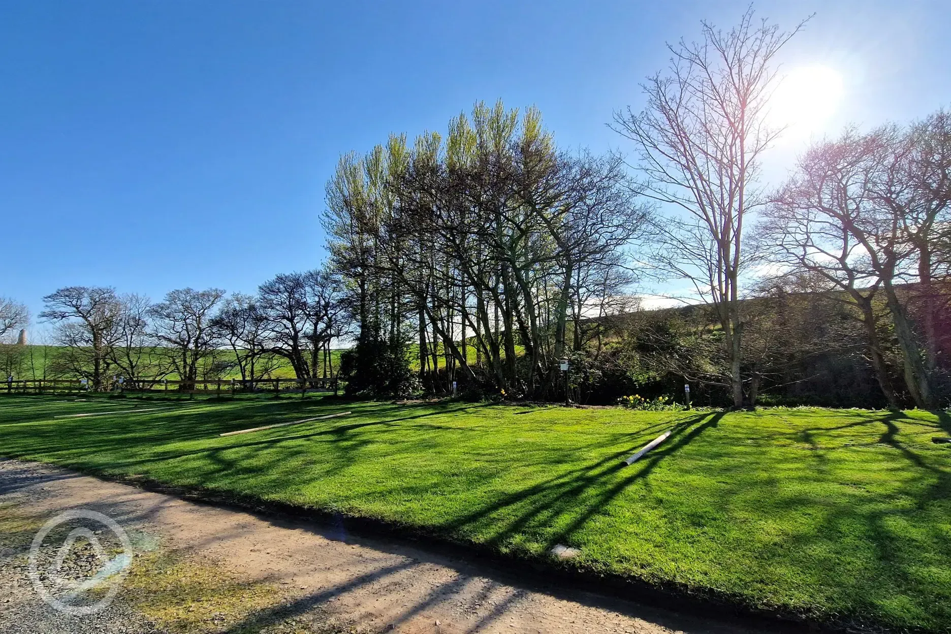 Riverside grass pitches with optional electric (not suitable for bell tents)