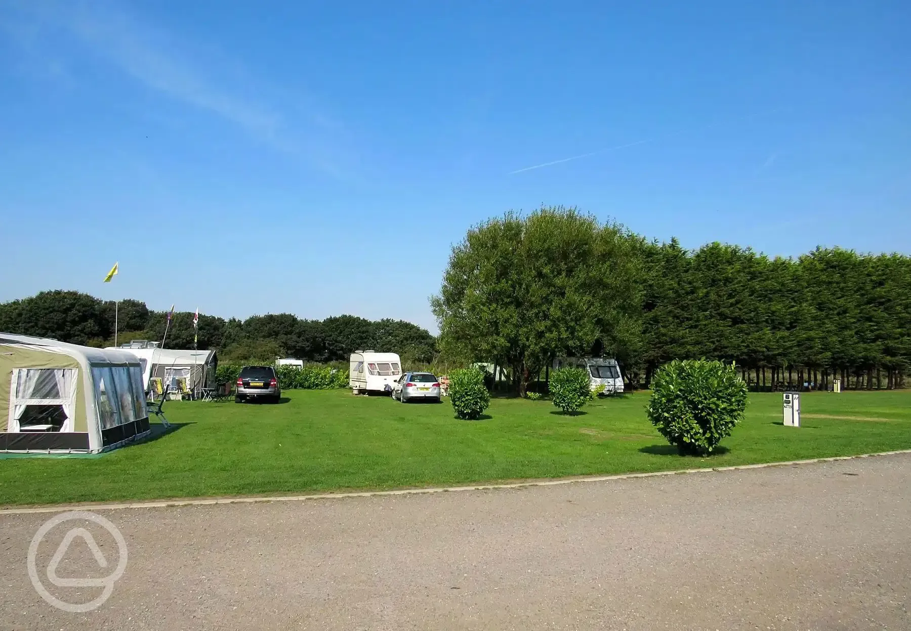 Open grass pitches with electric hook ups