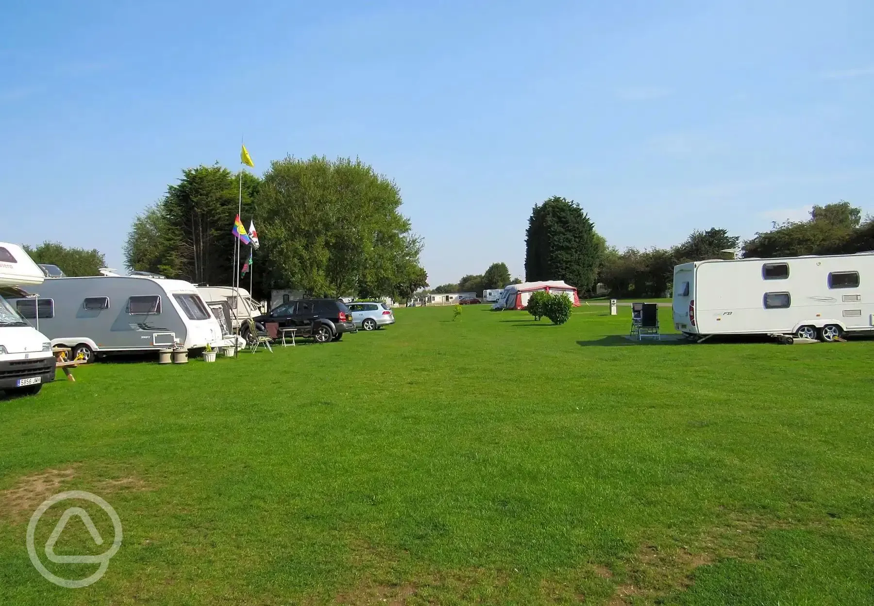 Open grass pitches with electric hook ups