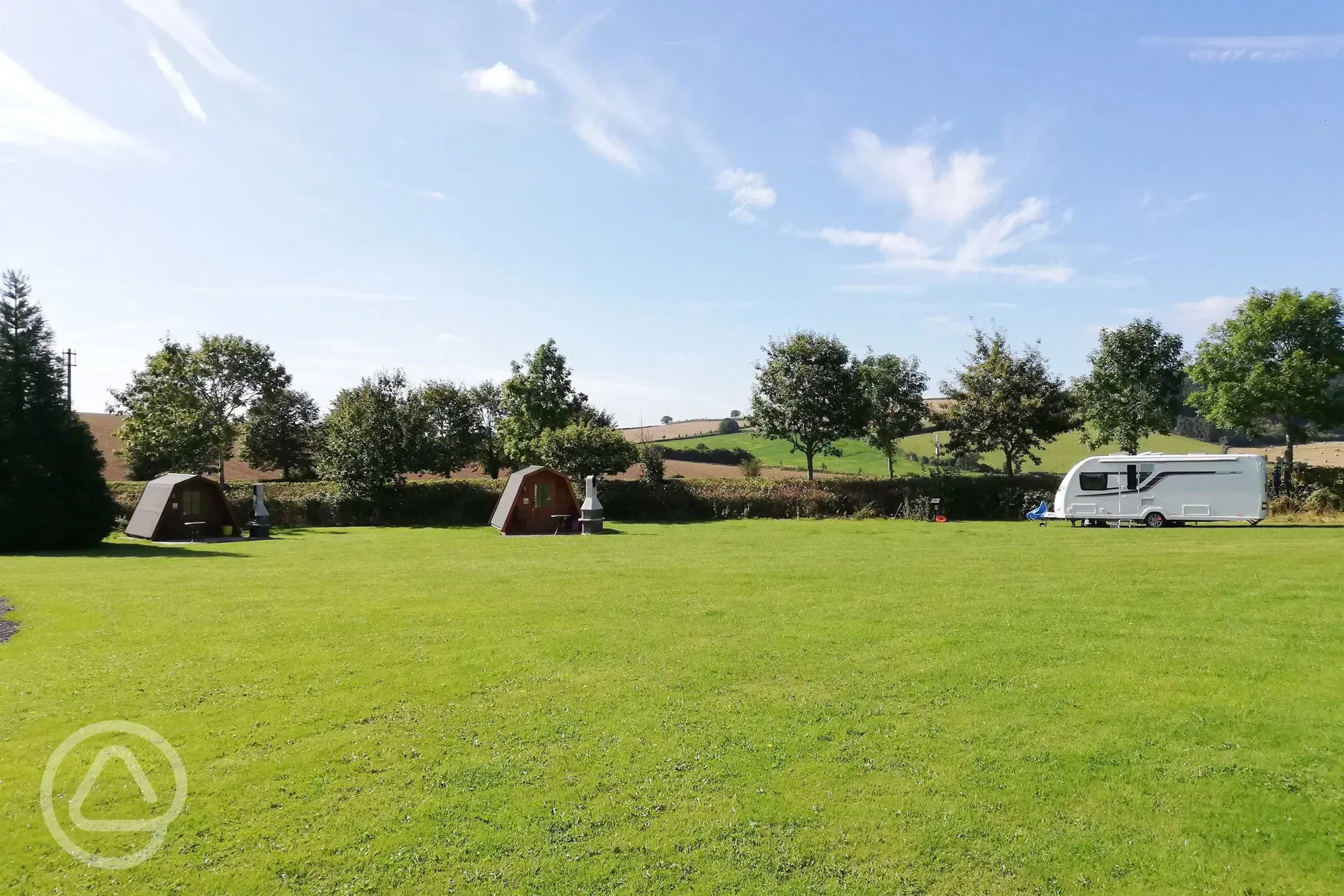 Grass pitches and glamping pods