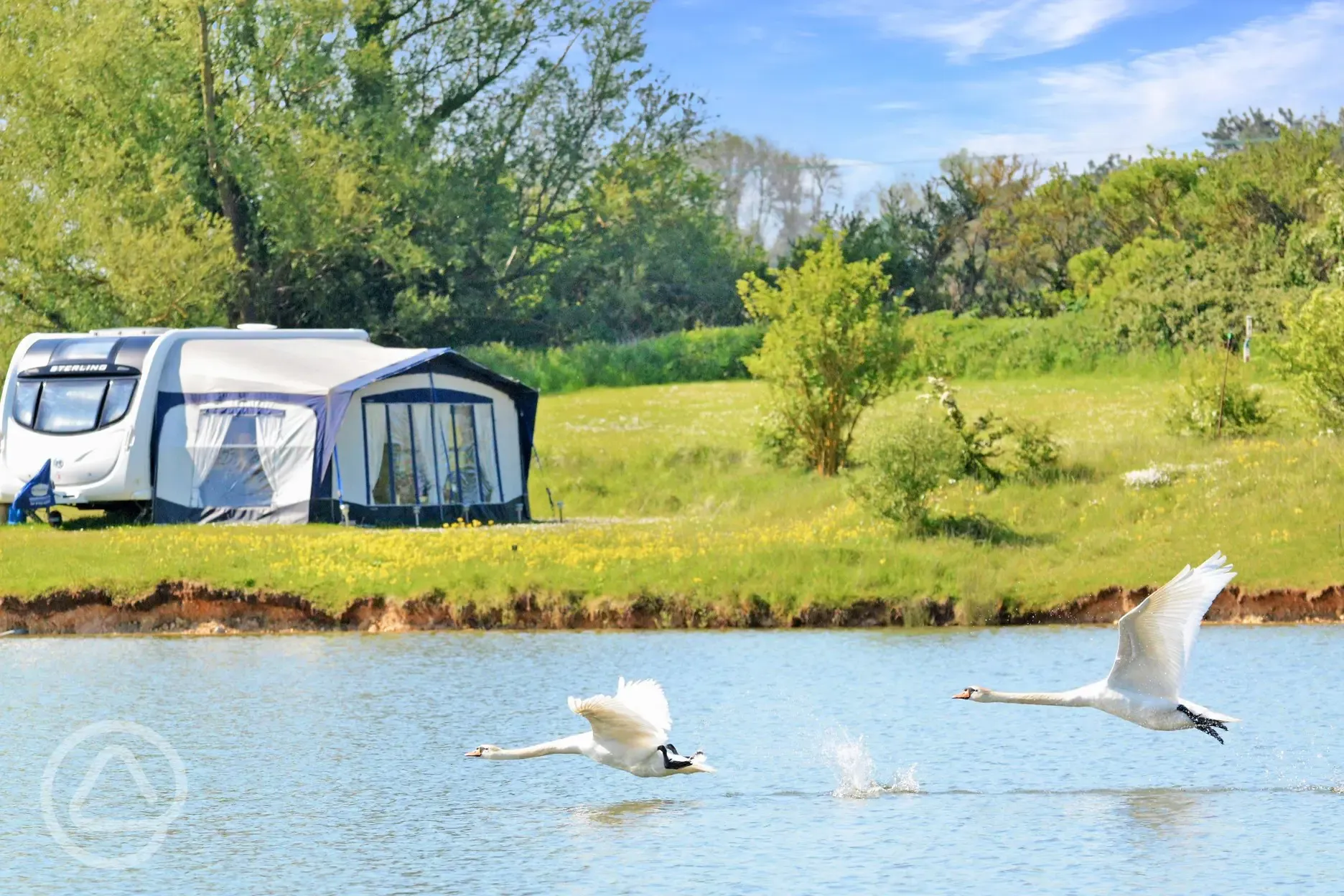 Caravan on optional electric grass pitches with awning space by the fishing lake Caravan on optional electric grass pitches with awning space by the fishing lake