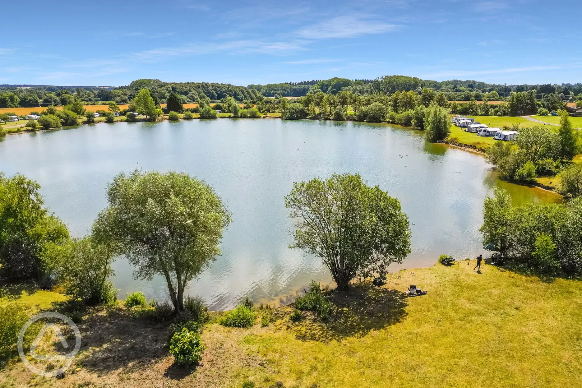 Coarse fishing lake stocked with bream, carp, roach, and more Coarse fishing lake stocked with bream, carp, roach, and more
