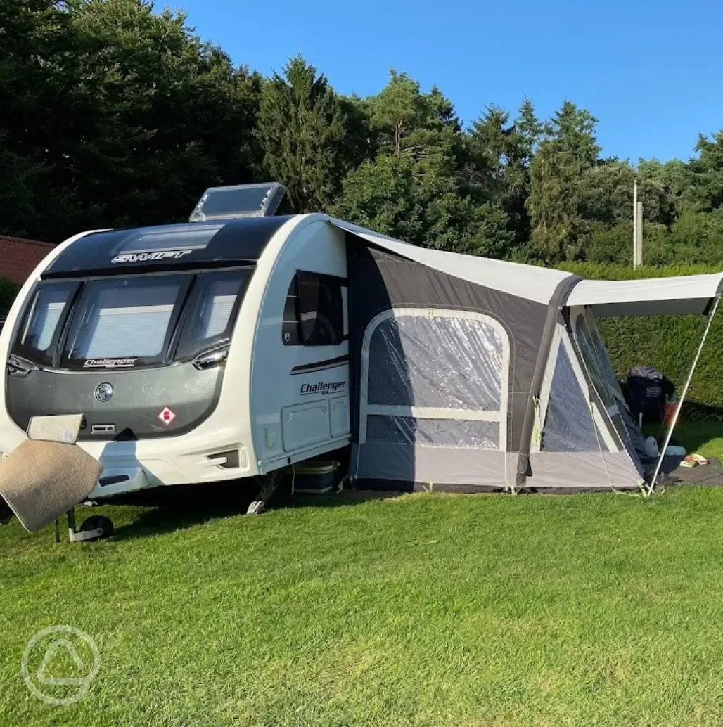 Caravan pitch with awning