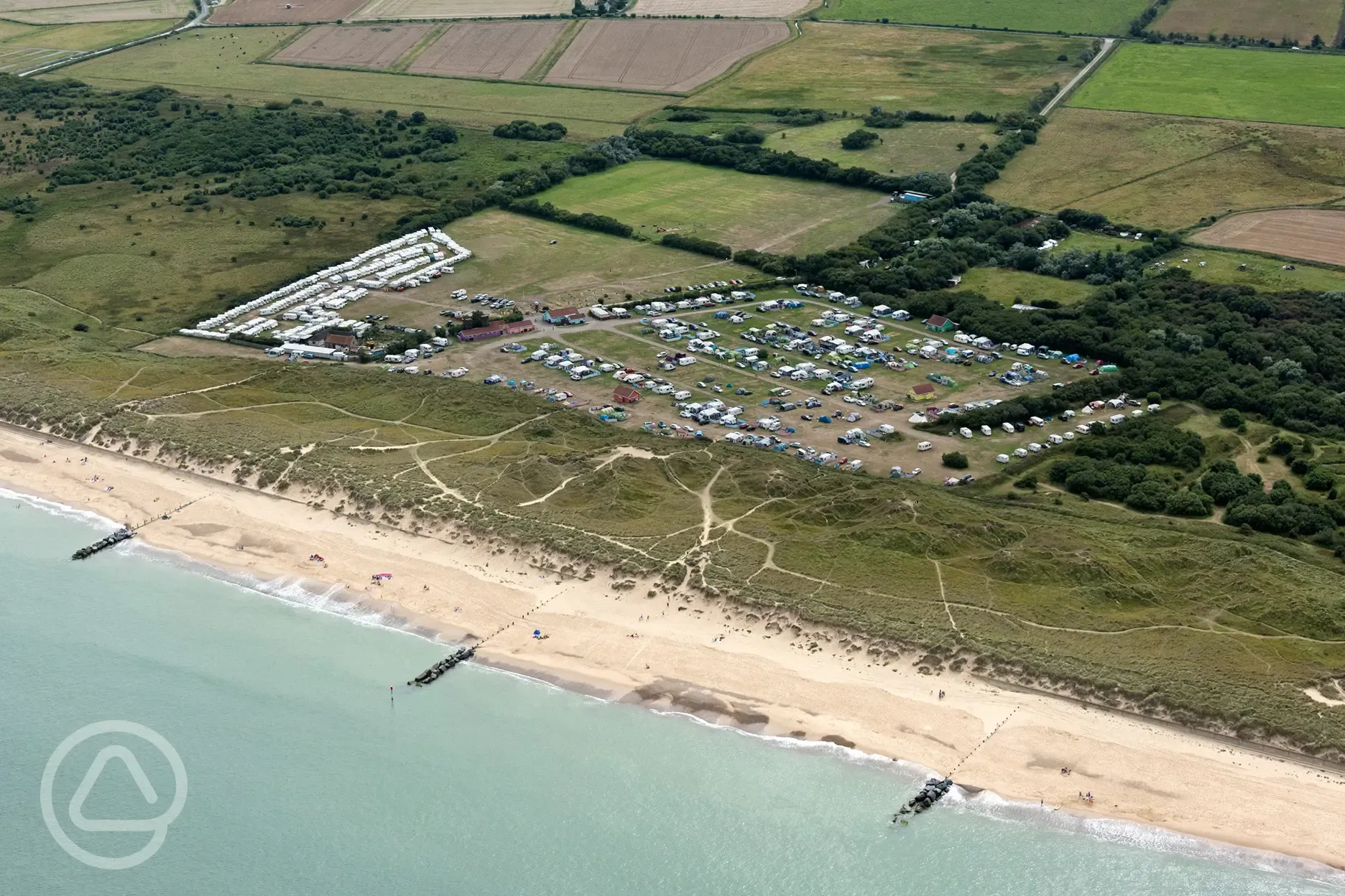 Aerial of campsite and the beach