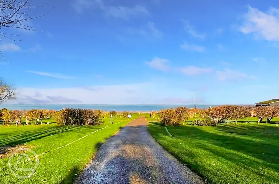 Electric grass pitches in the Church Field with sea views