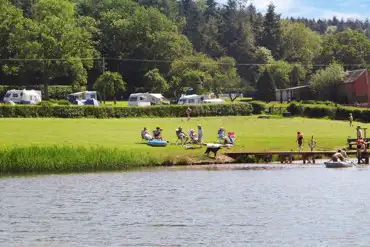 Guests enjoying the onsite lake