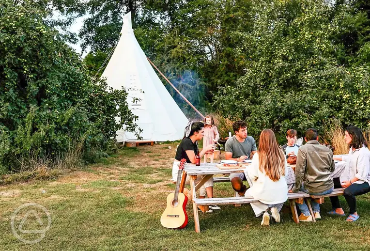 White House on Wye Glamping with tipis and picnic benches
