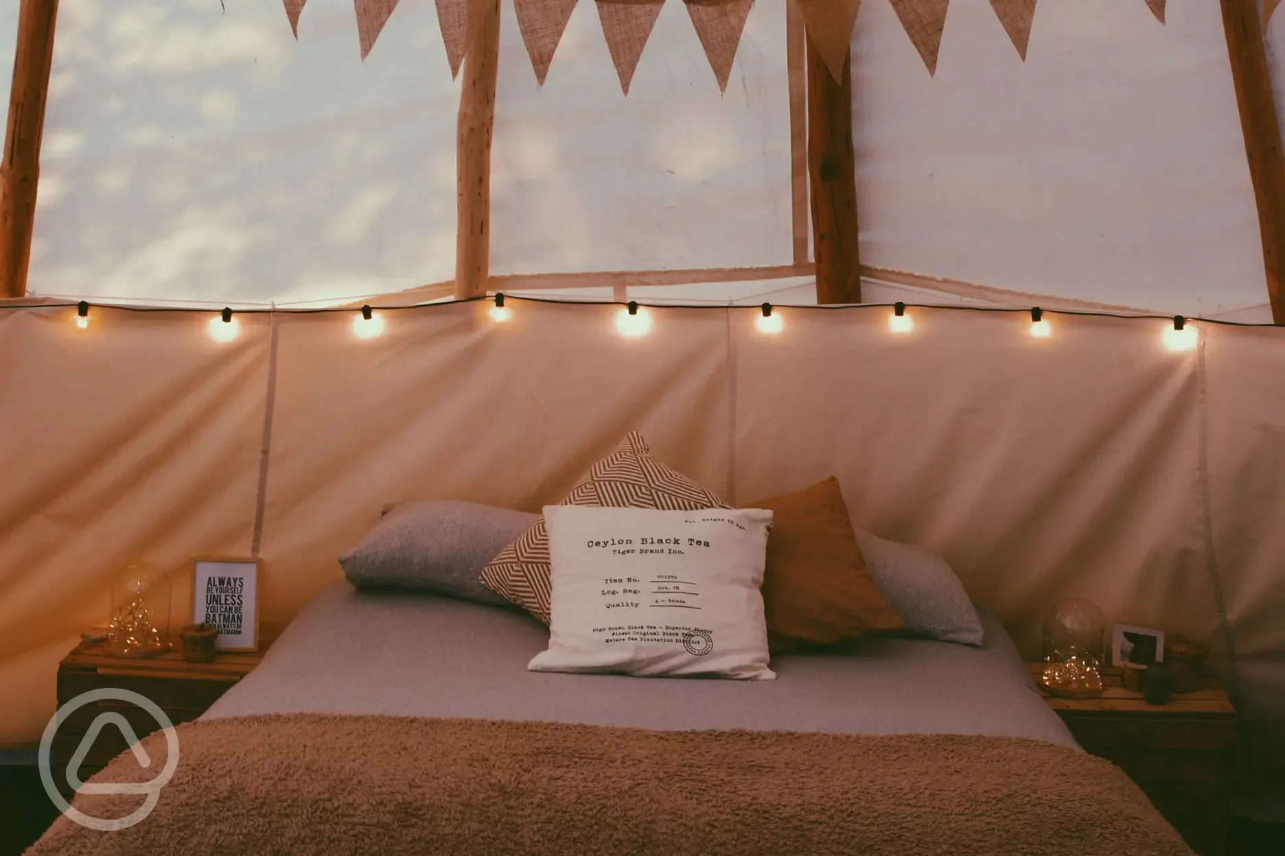 Fairy lights over the double bed