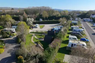 Aerial of the pitches and pods at Briarfields Motel and Touring Caravan Park