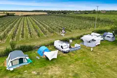 Aerial of the electric grass pitches (5m x 8m) at Painters Farm Campsite 