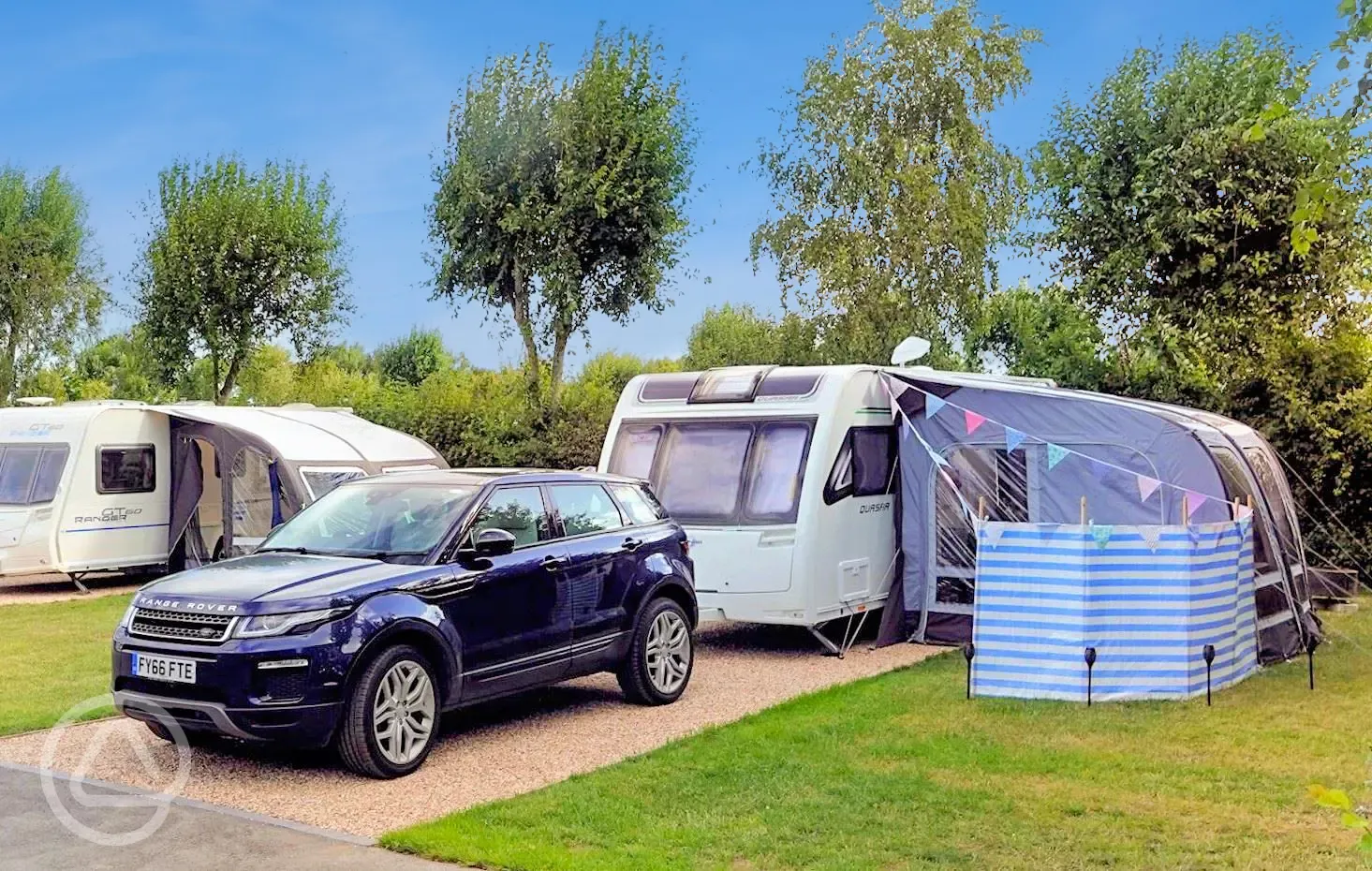 XL electric hardstanding pitches with 10 amp hook up