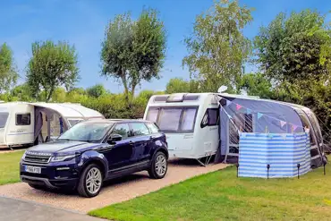 XL electric hardstanding pitches with 10 amp hook up