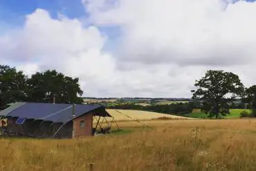 Safari tent and countryside views