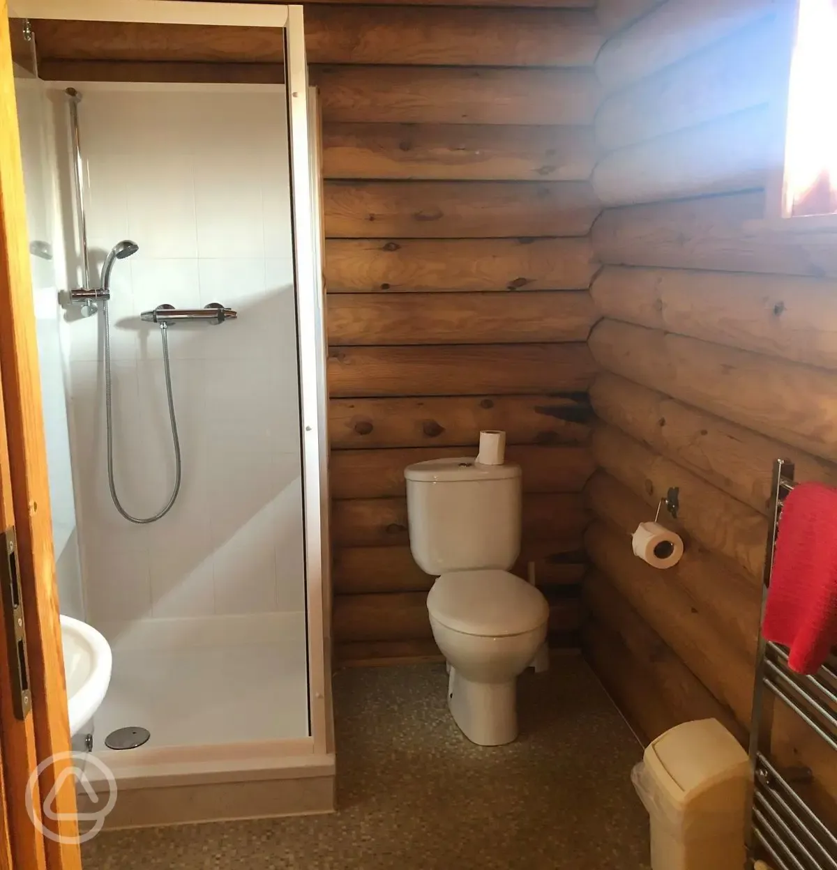 Log cabin shower and bathroom